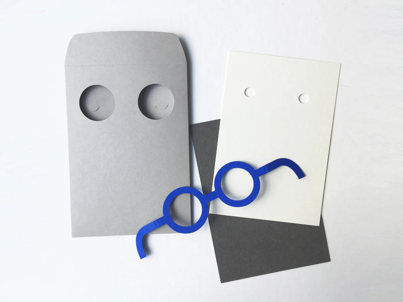 2 x the villa envelope and its round glasses